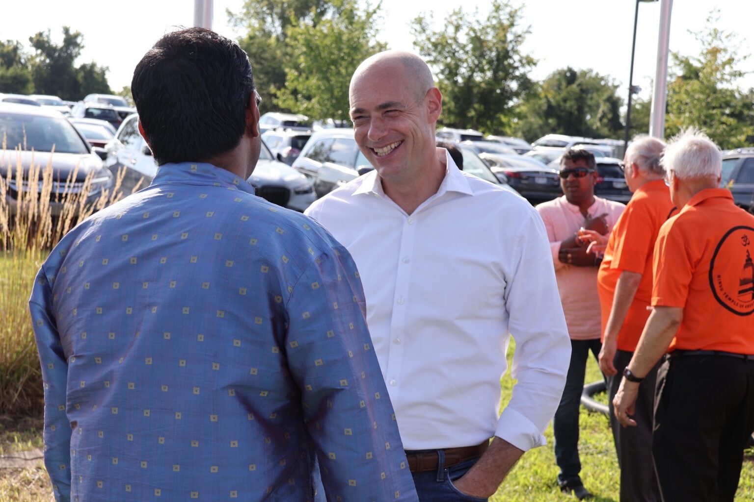 Landsman greeting a man