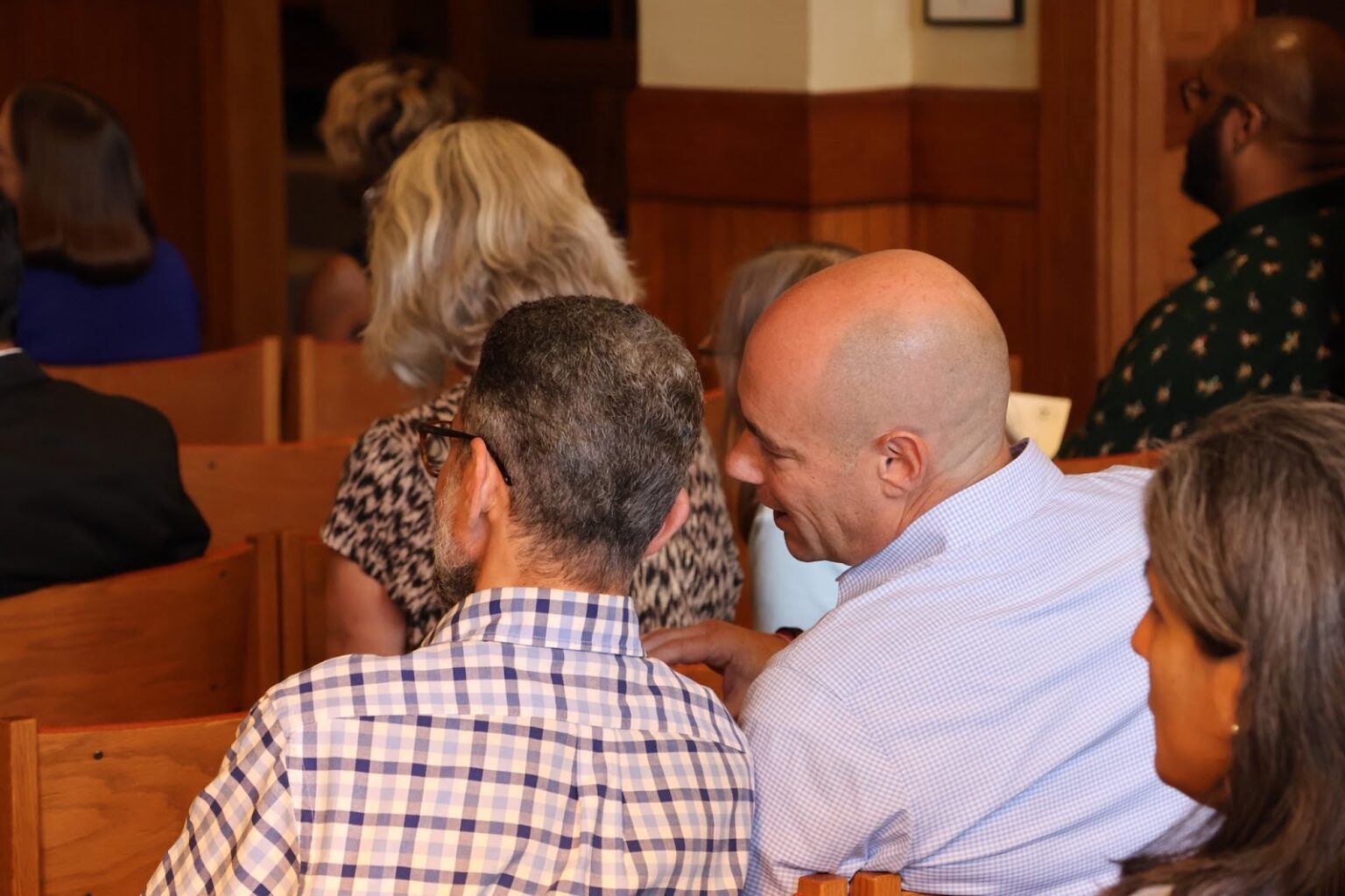Landsman talking with constituents
